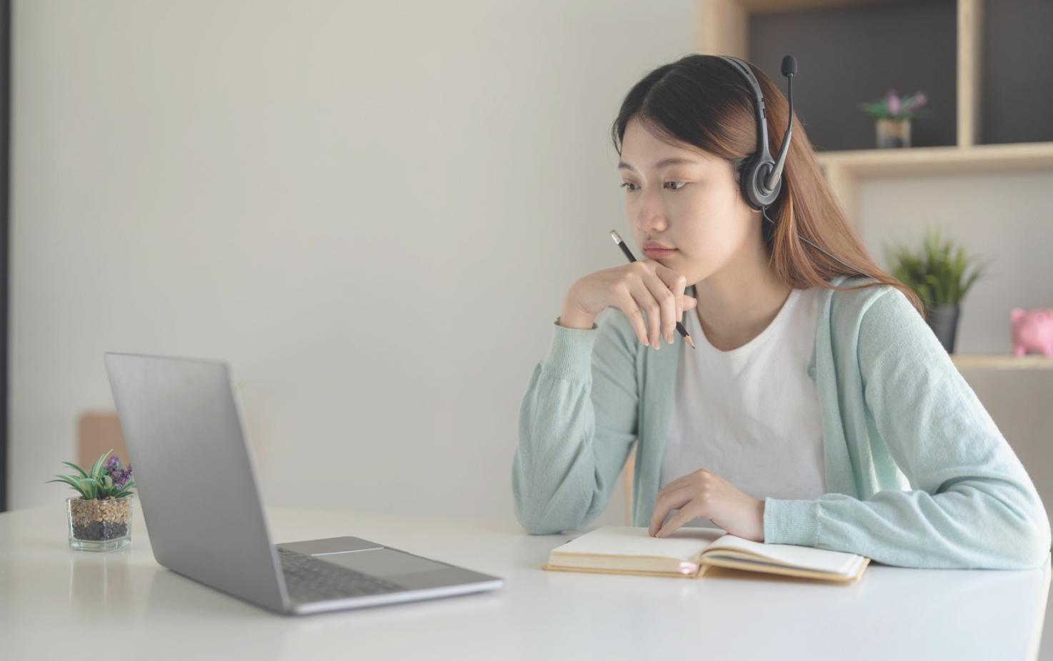 Business owner reviewing financial reports at desk