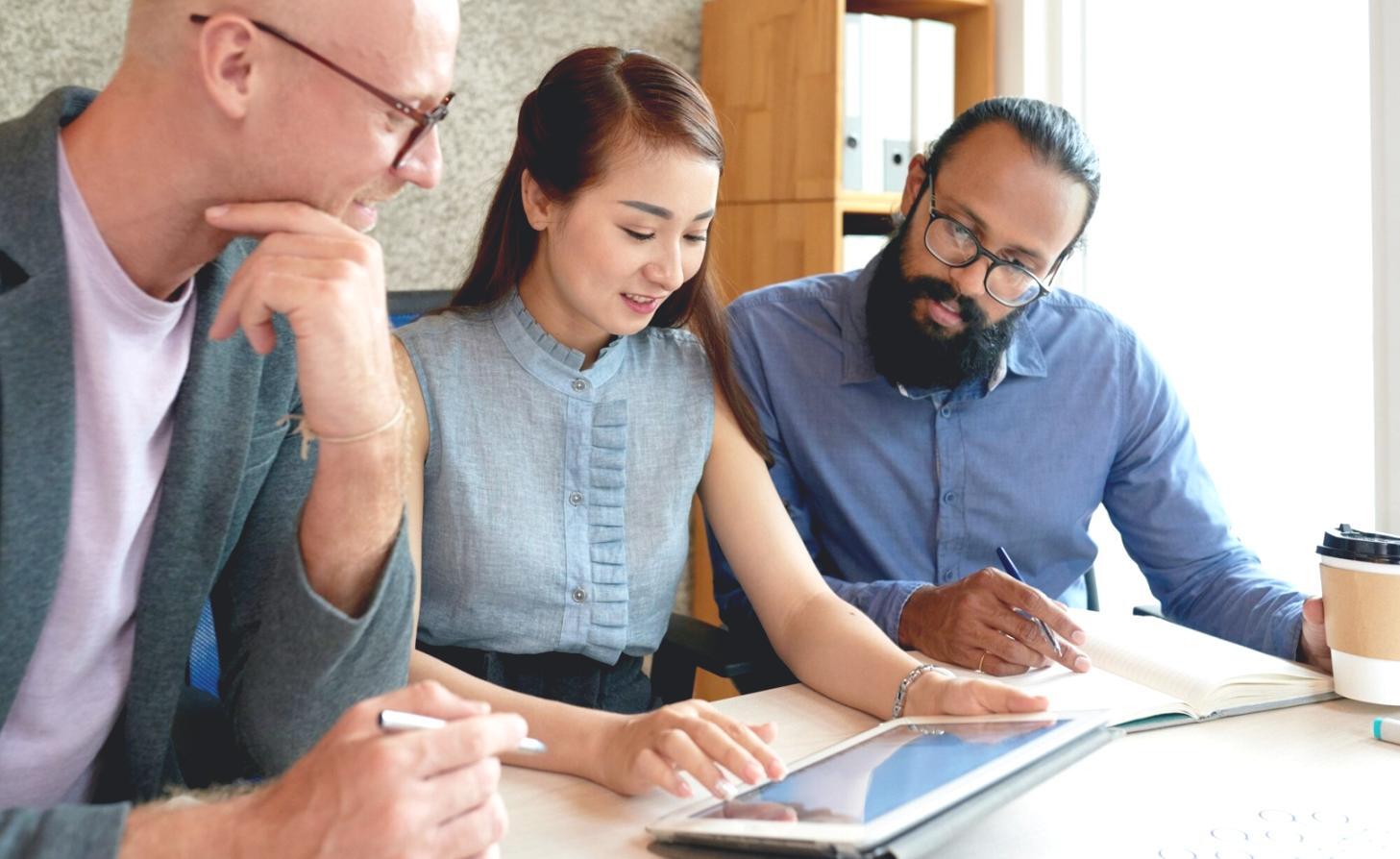 Business finance planning workspace showing financial documents and analysis tools